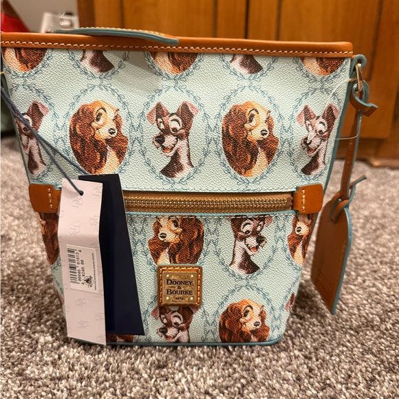 Dooney & Bourke Handbags - Dooney & Bourke Lady and the Tramp Crossbody Bag - Blue and Brown
